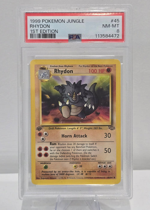 Rhydon 049/064 1st Edition — Jungle Set (1999) — PSA 8 VG - EX | Vintage Pokémon Graded Card - SEIM COLLECTS