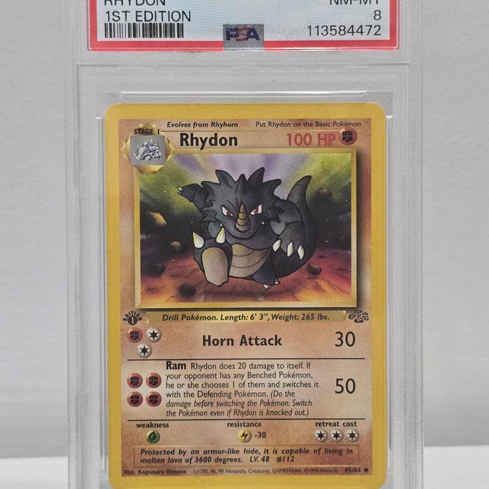 Rhydon 049/064 1st Edition — Jungle Set (1999) — PSA 8 VG - EX | Vintage Pokémon Graded Card - SEIM COLLECTS